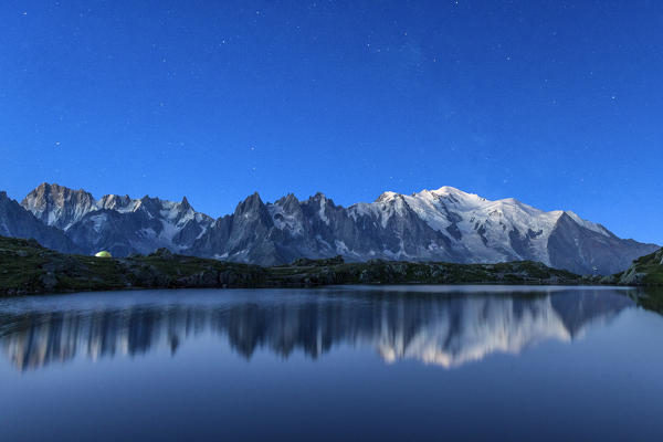 The Mont Blanc mountain range reflected in the waters of Lac de Chesery. Haute Savoie France