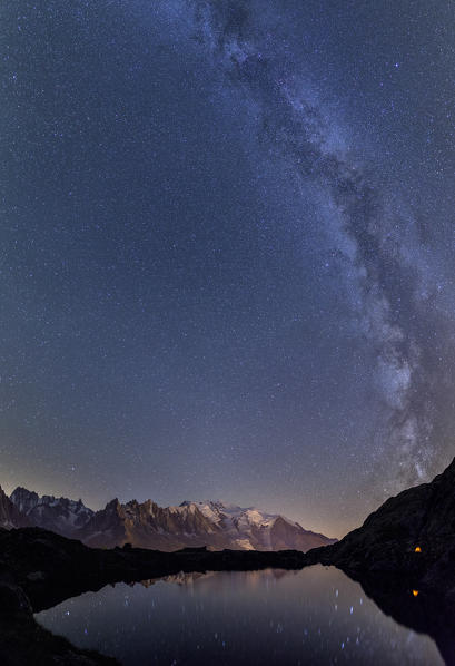 Star trail over Mont Blanc range seen from Lac de Chesery. Haute Savoie. Chamonix France