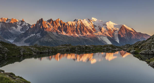 Sunset over  Lac de Cheserys. In the background the range of Mont Blanc. Haute Savoie. France