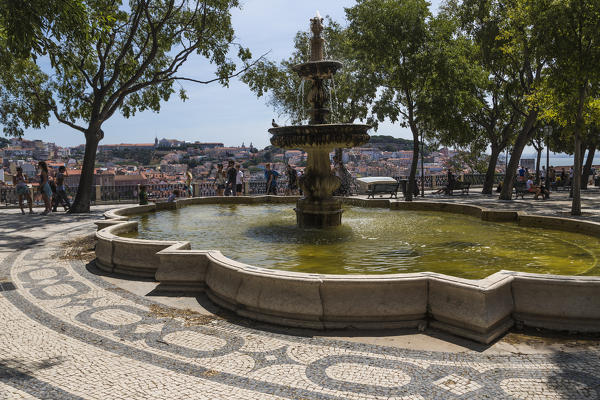 Fountain and square with decorative tiles on a terrace at Mirador de San Pedro de Alcántara Bairro Alto Lisbon Portugal Europe