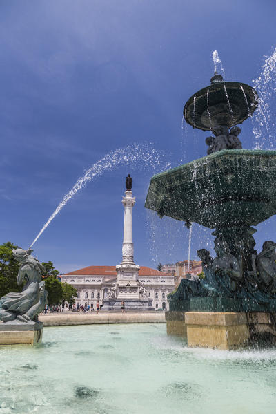 Fountain frames the old palace in Praça Dom Pedro IV also known as Rossio Square Pombaline Downtown of Lisbon Portugal Europe