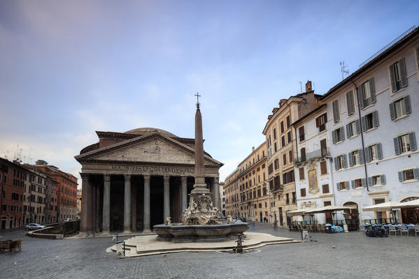 View of old Pantheon a circular building with a portico of granite Corinthian columns and its fountains Rome Lazio Italy Europe