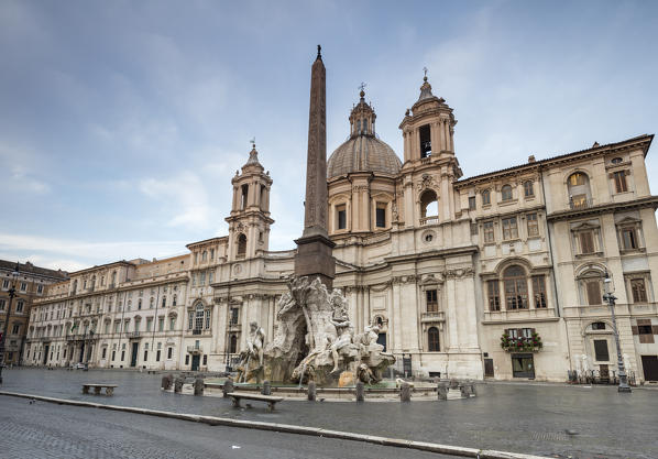 View of Piazza Navona with Fountain of the Four Rivers and the Egyptian obelisk in the middle Rome Lazio Italy Europe
