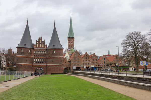 The historical gothic building of Holstentor the city gate for the old town Lübeck Schleswig Holstein Germany Europe