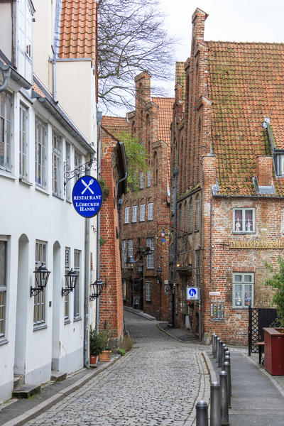 A typical alley in the ancient and gothic city center of Lübeck Schleswig Holstein Germany Europe