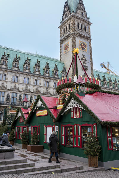 Christmas market and decorations with the bell tower in the background Rathaus Altstadt quarter Hamburg Germany Europe