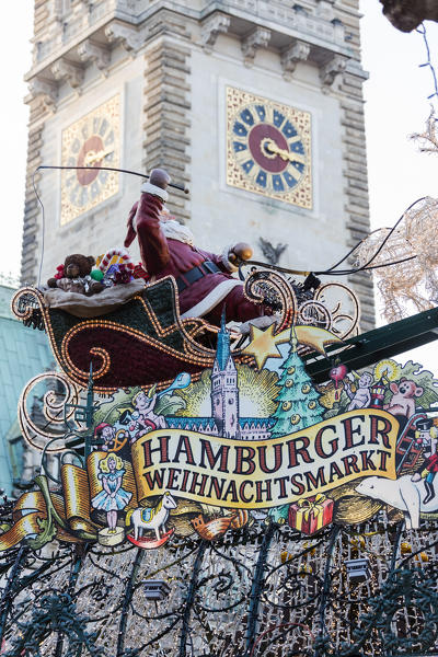 Christmas market and decorations with the bell tower in the background Rathaus Altstadt quarter Hamburg Germany Europe