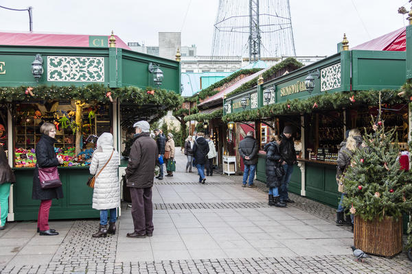 Christmas market and decorations surrounded by neoclassic architecture Rathaus square Altstadt quarter Hamburg Germany Europe