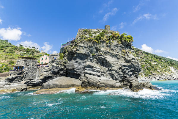 Turquoise sea frames the fortress perched on  promontory Cinque Terre National Park province of La Spezia Liguria Italy Europe