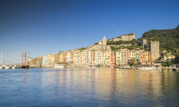 The blue sea frames the typical colored houses of Portovenere La Spezia province Liguria Italy Europe