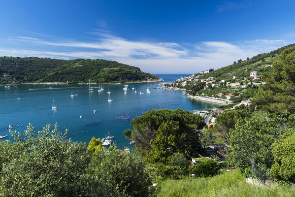 Green vegetation frames the turquoise sea of the Gulf of Poets surrounding Portovenere La Spezia province Liguria Italy Europe