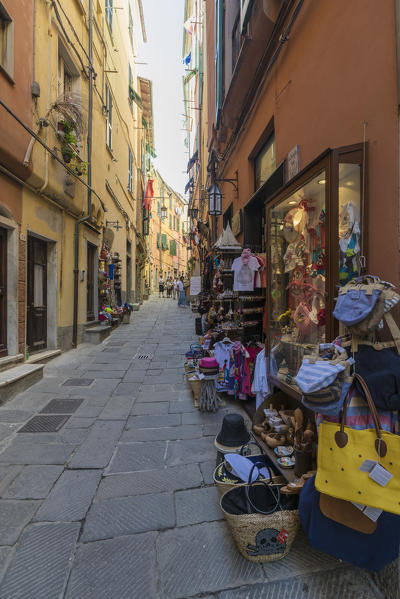 Souvenirs and local crafts and typical colorful houses in the old alleys of Portovenere La Spezia province Liguria Italy Europe