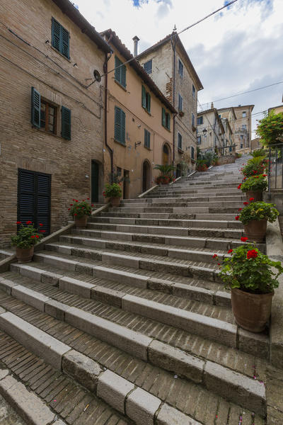 A typical flight of steps among the houses of the old town of Corinaldo  Province of Ancona Marche Italy Europe