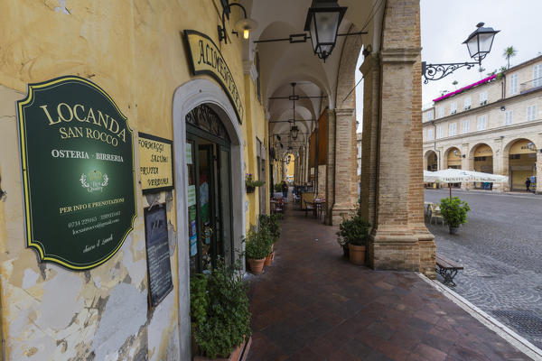 View of the historical buildings and arcades of Piazza del Popolo Fermo Marche Italy Europe