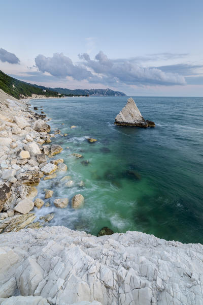 White cliffs frame the turquoise sea at sunrise La Vela Beach Portonovo province of Ancona Conero Riviera Marche Italy Europe