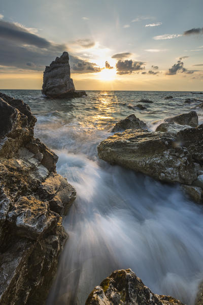 Waves of blue sea framed by sunrise La Vela Beach Portonovo province of Ancona Conero Riviera Marche Italy Europe
