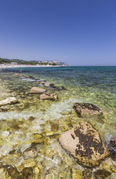 View of rocks framed by the turquoise sea at summer province of Ancona Conero Riviera Marche Italy Europe