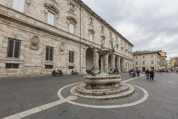Ancient buildings and decorated fountain in Arringo Square Ascoli Piceno Marche Italy Europe