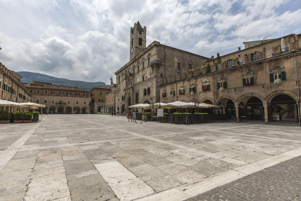 The old arcades frame the historical buildings of Piazza del Popolo Ascoli Piceno Marche Italy Europe