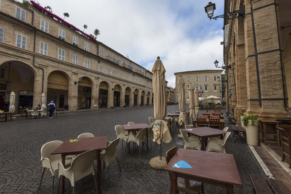 View of the historical buildings and arcades of Piazza del Popolo Fermo Marche Italy Europe