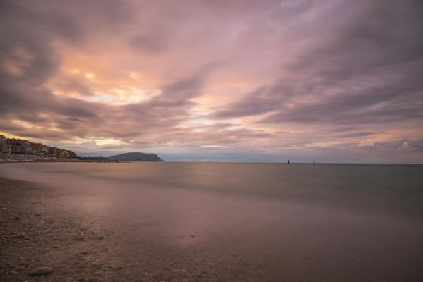Storm clouds are reflected in the clear water at sunset Porto Recanati Province of Macerata Conero Riviera Marche Italy Europe