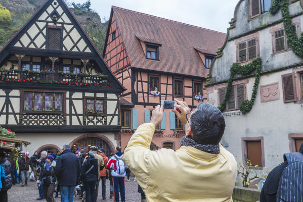 A typical house of the medieval old town enriched by Christmas ornaments Kaysersberg Haut-Rhin department Alsace France Europe