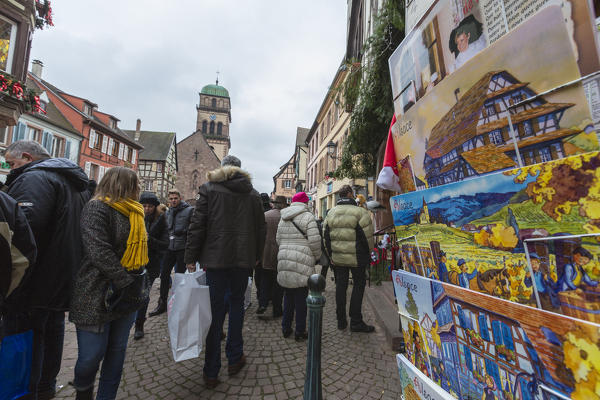 Tourists and Christmas Markets in the old medieval town of Kaysersberg Haut-Rhin department Alsace France Europe