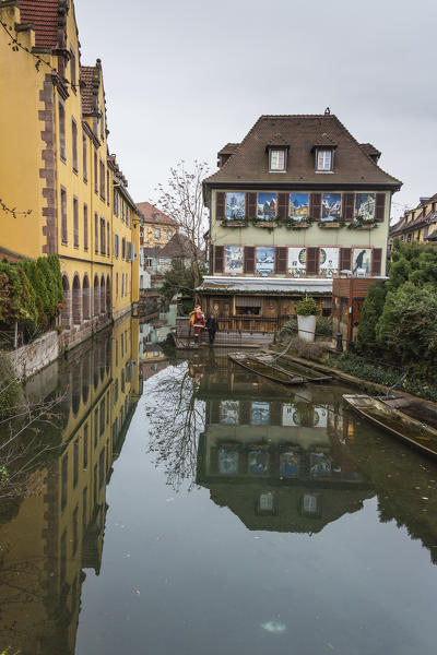 Colored houses reflected in river Lauch at Christmas time Petite Venise Colmar Haut-Rhin department Alsace France Europe