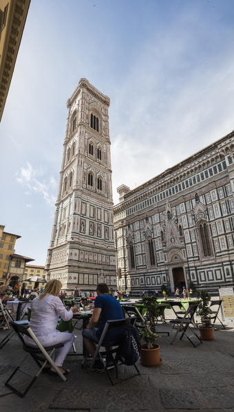 Tourists having lunch in the typical restaurants facing the Giotto's Campanile  Florence Tuscany Italy Europe