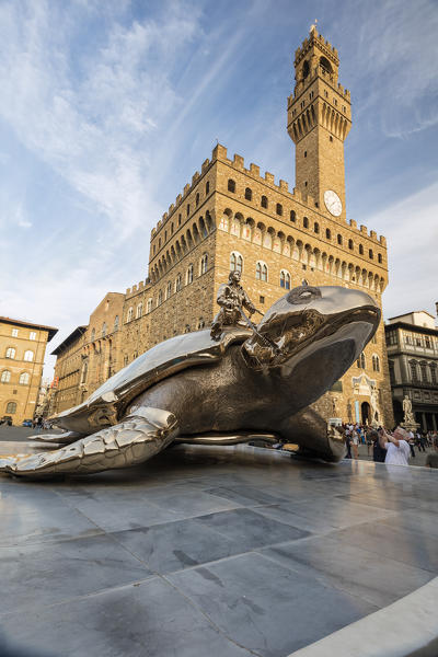 The golden sculpture of a turtle also known as Searching for Utopia in front of Palazzo Vecchio Florence Tuscany Italy Europe