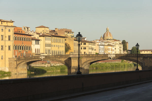 View of Ponte Della Vittoria  on the Arno River with Brunelleschi's Dome in the background Florence Tuscany Italy Europe