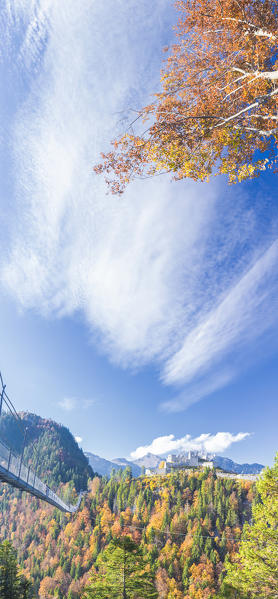 Panorama of the suspension bridge called Highline 179 framed by colorful woods in autumn Ehrenberg Castle Reutte Austria Europe