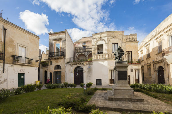 Statues and baroque style buildings surrounded by gardens in the old town of Lecce Apulia Italy Europe