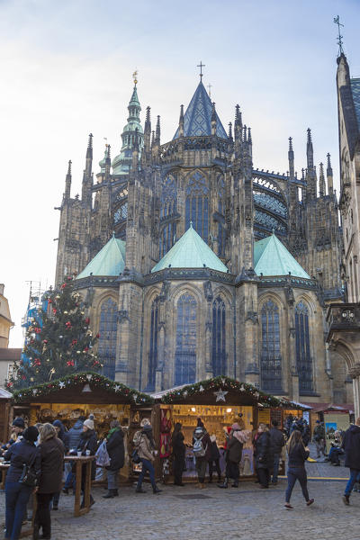 Tourists at the Christmas markets facing the Cathedral of Saint Vitus Old Town Square Prague Czech Republic Europe