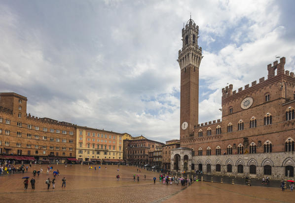 View of Piazza del Campo with the historical Palazzo Pubblico and its Torre del Mangia Siena Tuscany Italy Europe