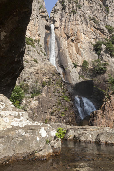 The Piscia di Gallo waterfall surrounded by granite rocks and natural pools Zonza Southern Corsica France Europe