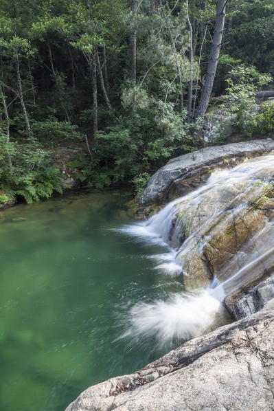 View of the Purcaraccia waterfalls and natural pools in summer Punta di Malanda Bavella Mountains Quenza Corsica France Europe