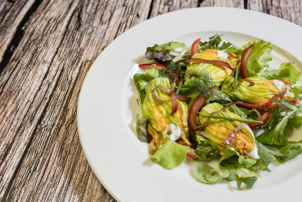 Courgette flowers filled with goat cheese, monastery of Astino, Longuelo, province of Bergamo, Lombardy, Italy, Europe
