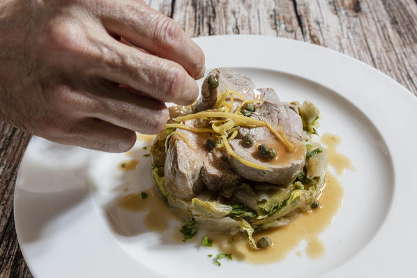 Typical dish made of piglet meat, monastery of Astino, Longuelo, province of Bergamo, Lombardy, Italy, Europe