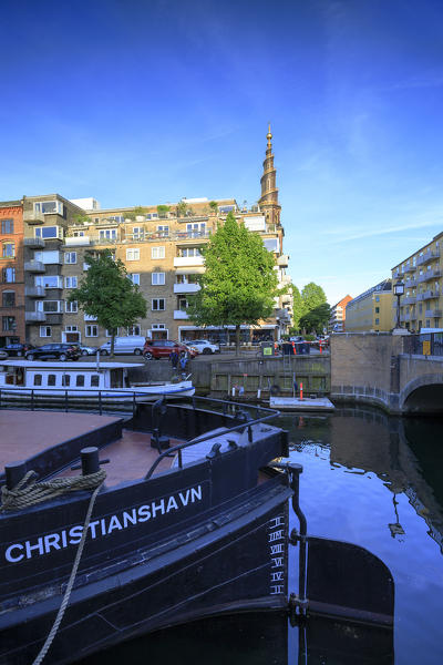Boats and tourist ferry moored in Christianshavn Canal, Copenhagen, Denmark