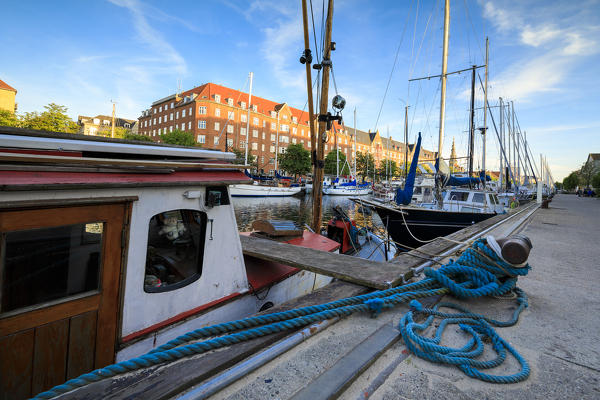 Boats moored in Christianshavn Canal, Copenhagen, Denmark