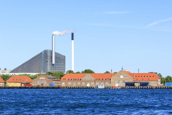 Industrial area and buildings seen from a boat trip along the canals of Copenhagen, Denmark