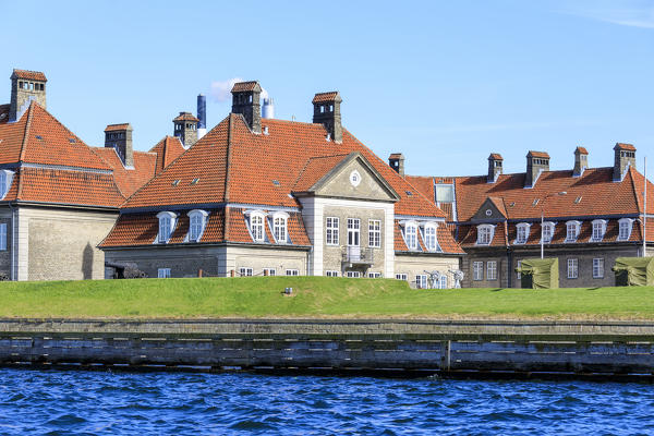 Typical houses of residential area seen from a boat trip along the canals of Copenhagen, Denmark
