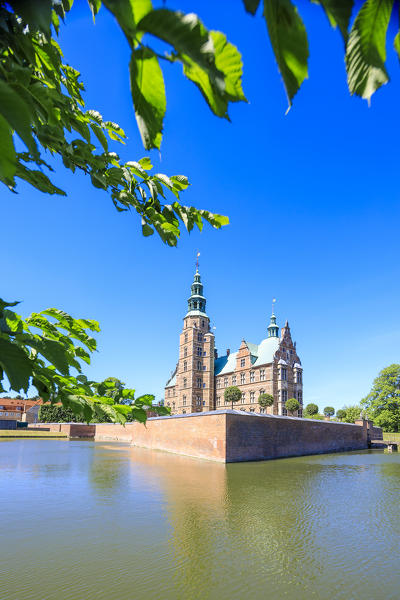 Rosenborg Castle built in the Dutch Renaissance style seen from the banks of canal, Copenhagen, Denmark