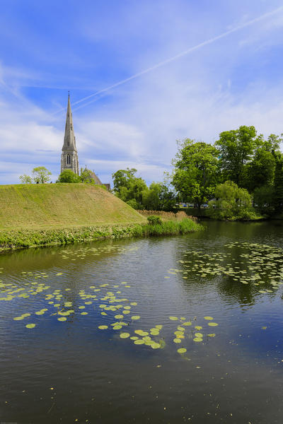 Pond and bell tower, The Citadel (Kastellet), Copenhagen, Denmark