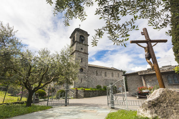 Bell tower and crucifix, Piona Abbey (Abbazia Priorato di Piona), Colico, Lecco province, Lombardy, Italy