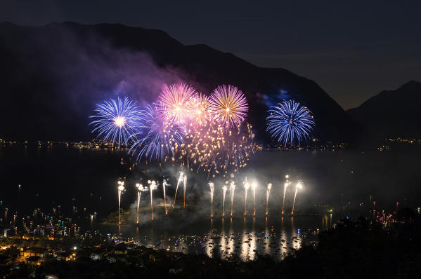 Fireworks during the traditional festival of San Giovanni, Ossuccio, Isola Comacina, Lake Como, Lombardy, Italy