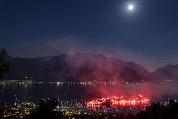 Smoke in the sky after the fireworks show, Ossuccio, Isola Comacina, Lake Como, Lombardy, Italy