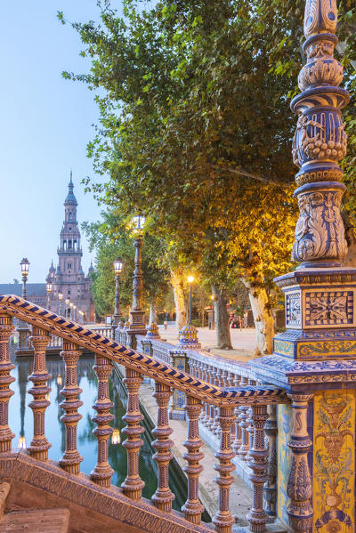 Decorated ceramic balustrade and balcony of typical bridge on the canal, Plaza de Espana, Seville, Andalusia, Spain