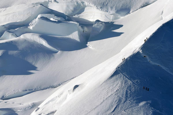 Mountaineering climbing Mont Blanc (Monte Bianco), Aosta Valley, Italy, Europe.